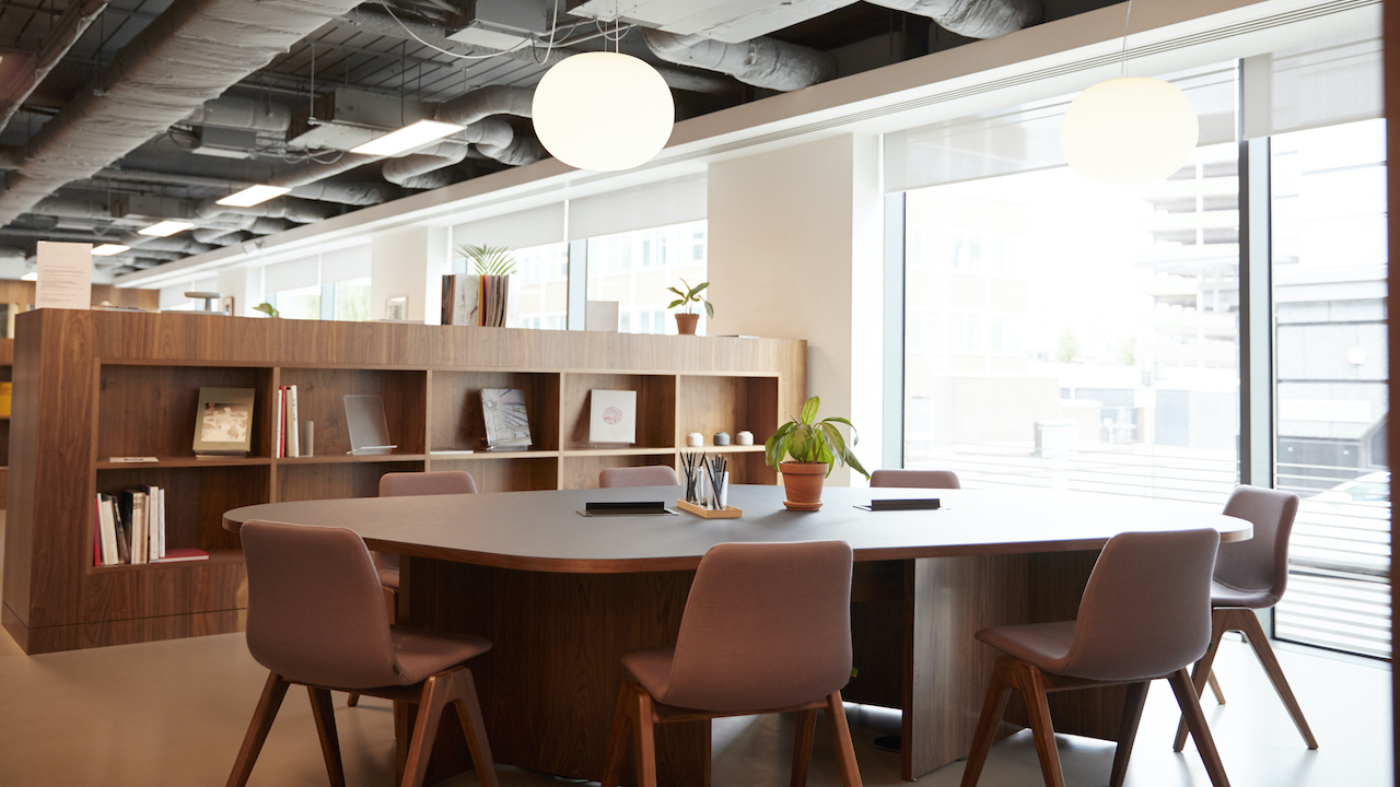 Contact Us Chairs Around Table In Empty Modern Meeting Area Of Office